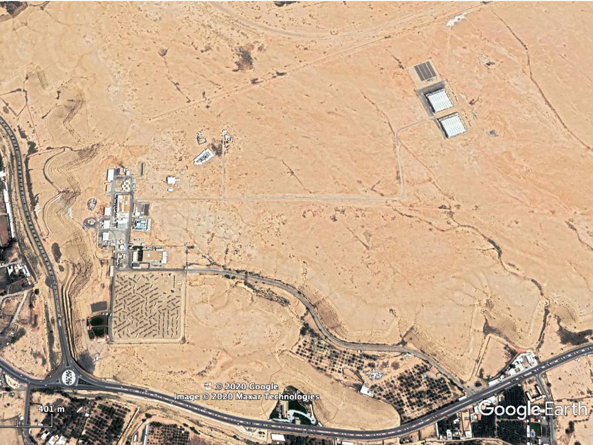 In an image provided by Maxar Technologies/Google Earth, two square buildings that some analysts think could be a Saudi nuclear facility, near the Solar Village, bottom left. The New York Times