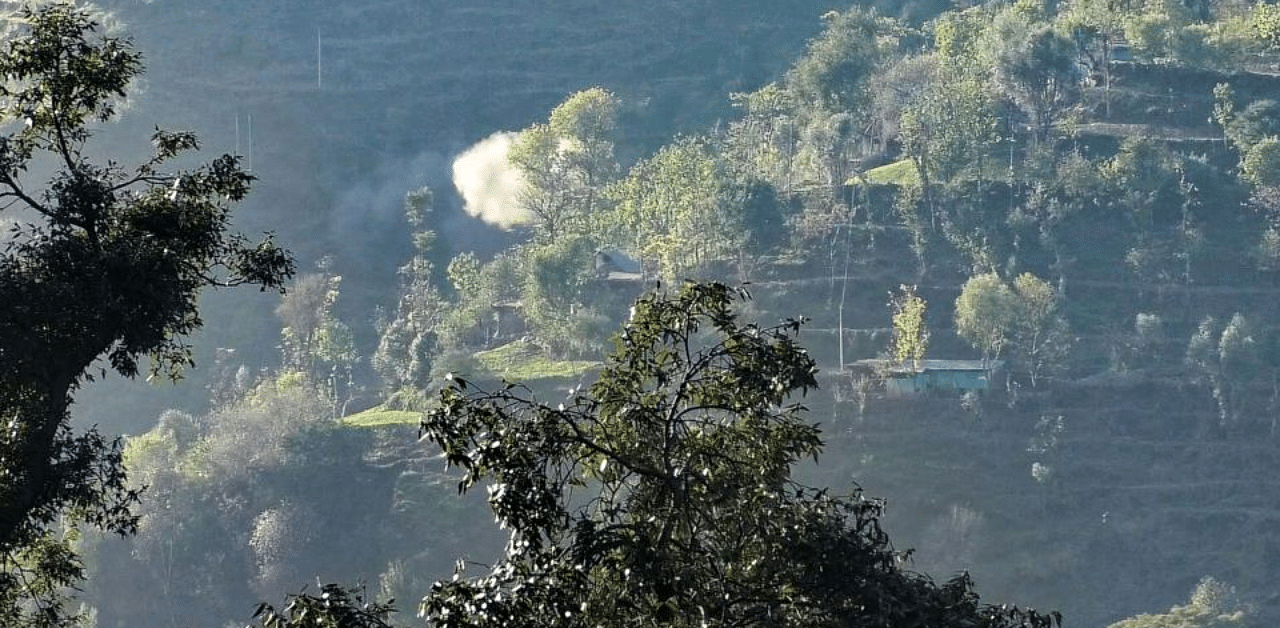  Smoke rises from a mortar shell that was allegedly fired by the Pakistani troops. Credit: PTI
