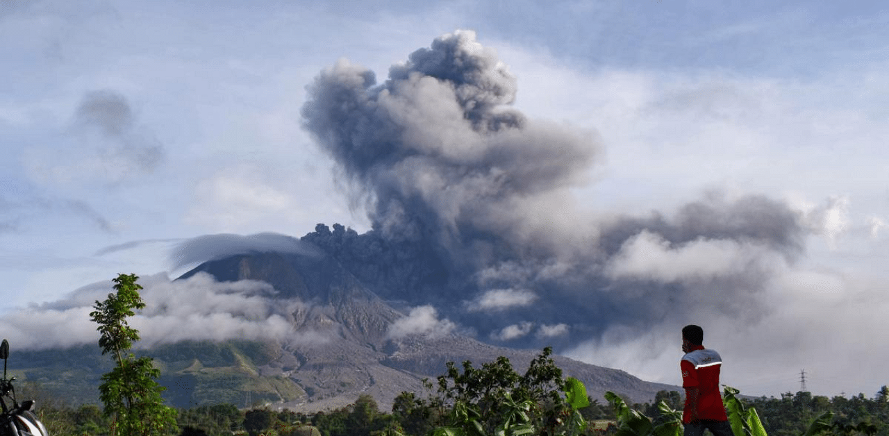 Indonesia's Mount Sinabung erupted again with a string of blasts that sent plumes of ash two kilometres (1.2 miles) into sky, triggering a flight warning and fears of lava flows. Credit: AFP Photo