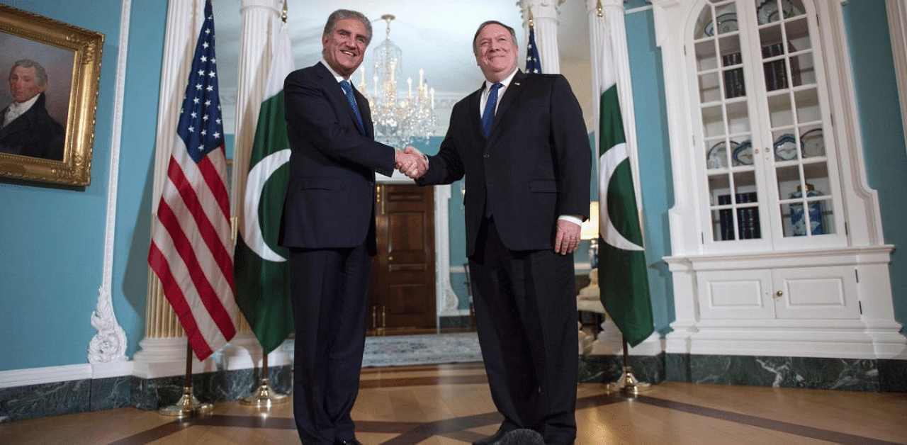 US Secretary of State Mike Pompeo (R) meets with Pakistani Foreign Minister Shah Mehmood Qureshi. Credit: AFP Photo