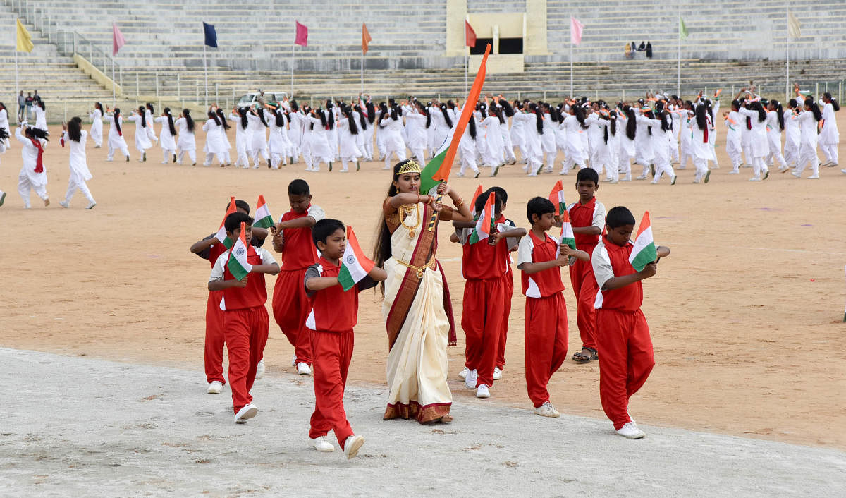 School students participate in the Independence Day celebrations last year. DH File Photo