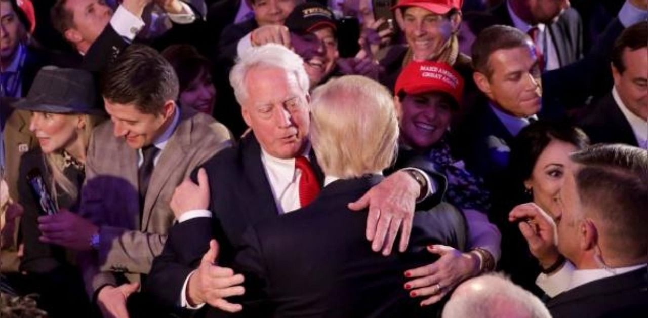 Donald Trump hugs his brother Robert Trump. Credit: AFP Photo