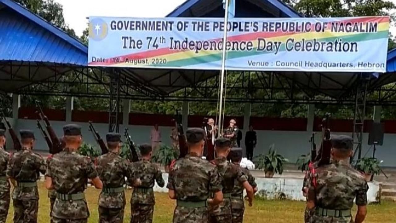 NSCN (IM) members hoisting 'Naga National Flag' at camp Hebron in Nagaland to celebrate their 'Independence Day'. Credit: DH photo