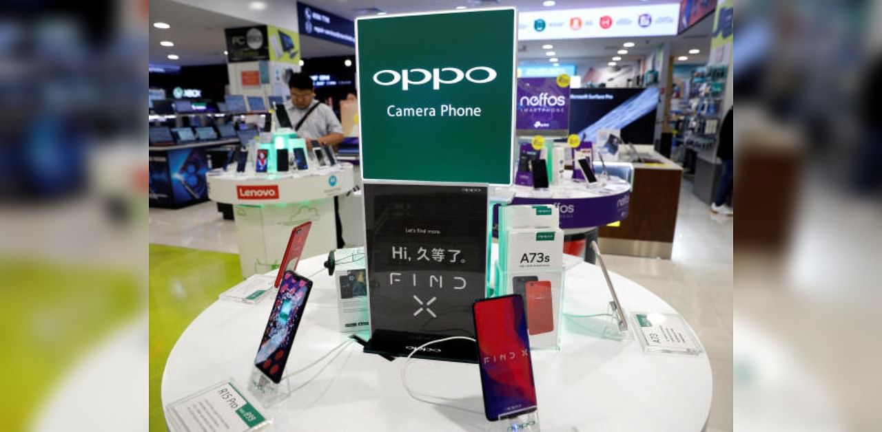 Oppo smartphones are displayed in a shop. Credit: Reuters