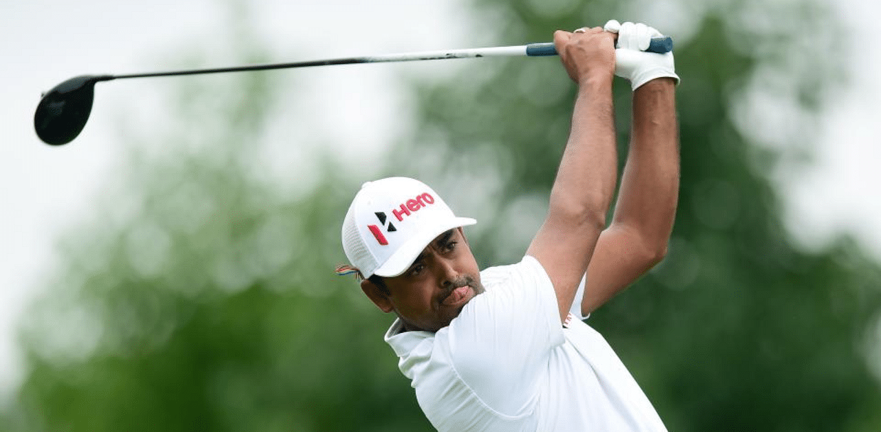 Anirban Lahiri of India plays his shot from the 18th tee during the first round of the Wyndham Championship at Sedgefield Country Club. Credit: AFP Photo