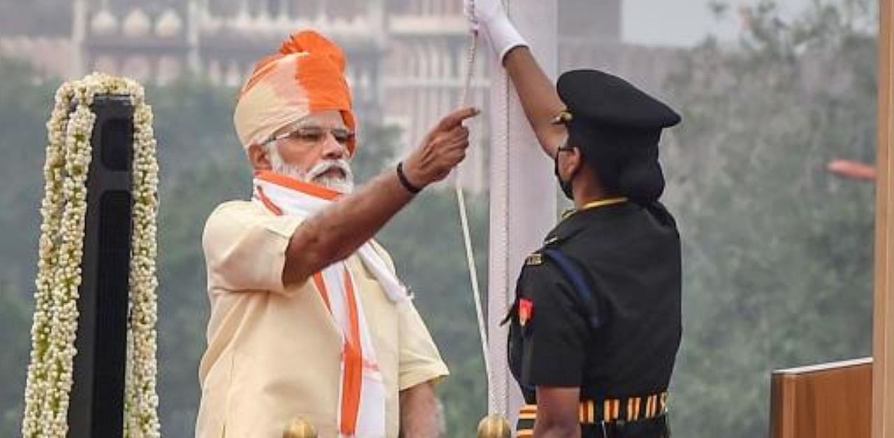 Major Shweta Pandey, assists Prime Minister Narendra Modi in unfurling the national flag during the 74th Independence Day celebrations, at Red Fort in New Delhi. Credit: PTI Photo
