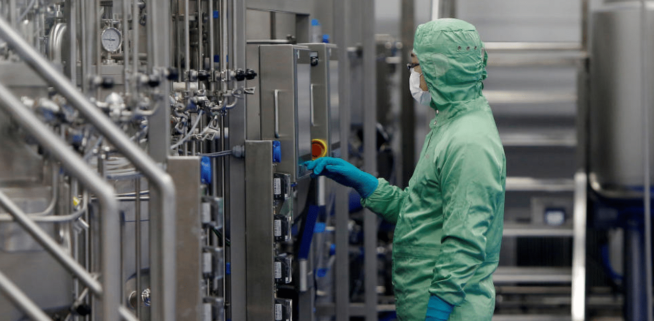 A technician works at a manufacturing facility of Chinese vaccine maker CanSino Biologics in Tianjin, China. Credit: Reuters Photo