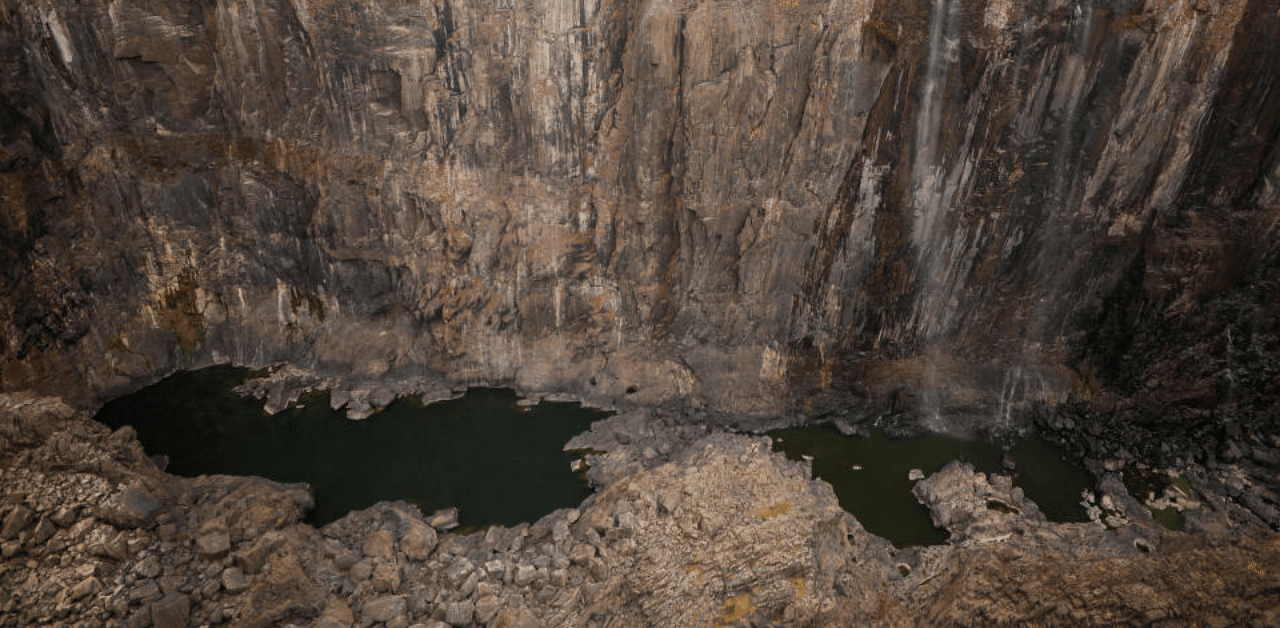 Dry cliffs are seen following a prolonged drought at Victoria Falls, Zimbabwe, December 4, 2019. Credit: Reuters Photo