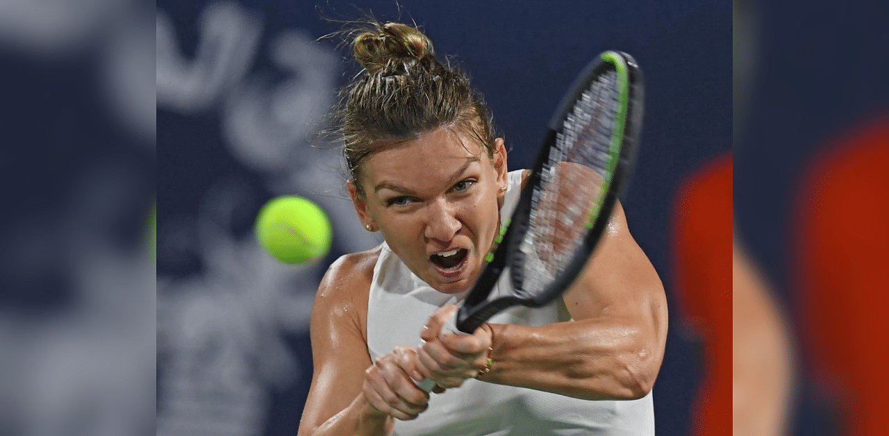 Romania's Simona Halep returns the ball to Kazakhstan's Elena Rybakina in the final of the Dubai Duty Free Tennis Championships in the United Arab Emirates. Credit: AFP File Photo