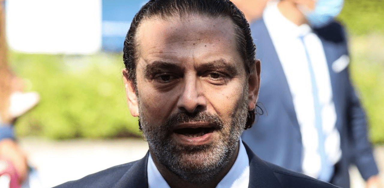 Former Lebanese prime minister Saad Hariri, speaks to the press as he leaves the UN-backed Special Tribunal for Lebanon (STL) at Leidschendam. Credit: AFP