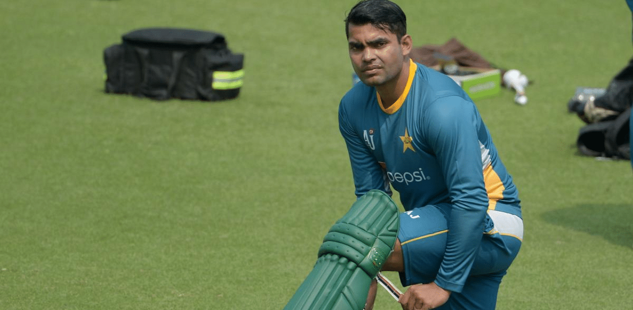 Umar was banned for three years in April by a one-man disciplinary panel of the board after he failed to report two approaches to spot-fix matches in the Pakistan Super League in February. Credit: AFP Photo