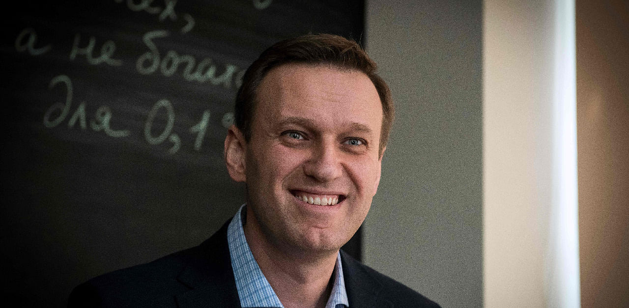 Russian opposition leader Alexei Navalny smiles during an interview with AFP at the office of his Anti-corruption Foundation (FBK) in Moscow. Credit: AFP Photo