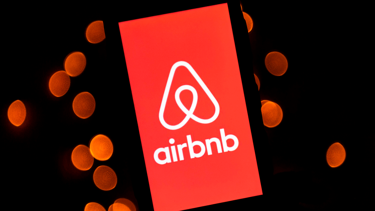 Logo of the online lodging service Airbnb displayed on a smartphone in Paris. Credits: AFP Photo