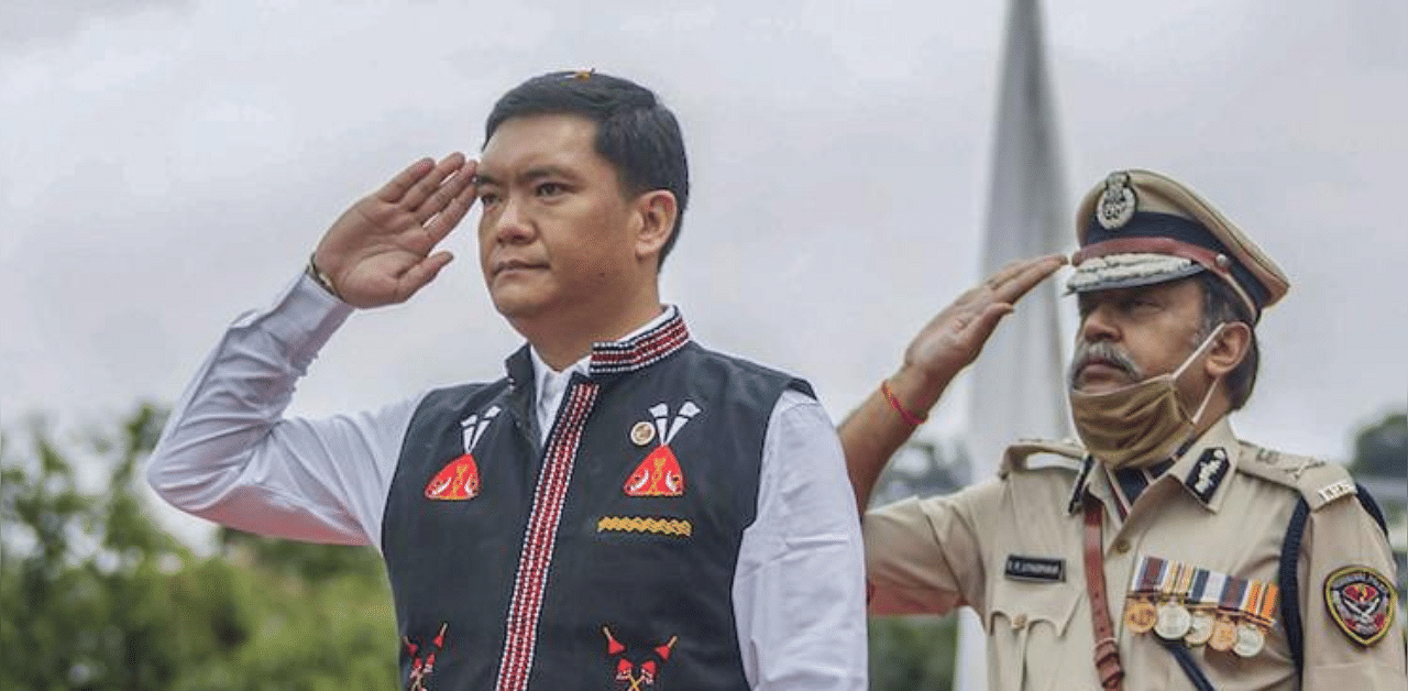 Arunachal Pradesh Chief Minister Pema Khandu after hoisting the National Flag during the Independence Day. Credit: PTI Photo
