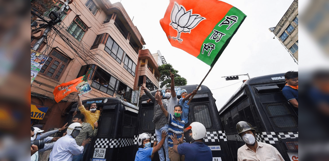  Police detain BJP activists during a protest demonstration over alleged vandalism at Visva-Bharati campus, in Kolkata, Wednesday, Aug. 19, 2020.  Credit: PTI Photo