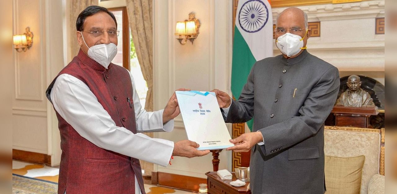 New Delhi: HRD Minister Ramesh Pokhriyal Nishank presents to President Ram Nath Kovind a copy of the new National Education Policy 2020, in New Delhi, Tuesday, Aug 4, 2020. Credit: PTI Photo