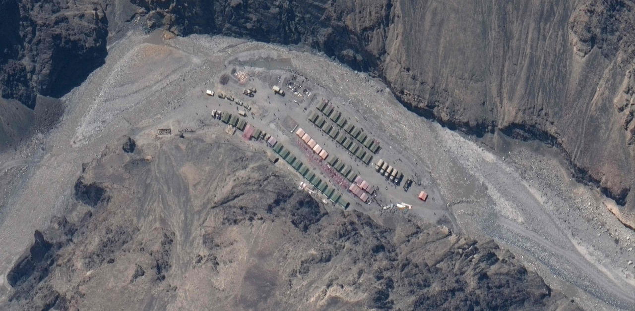 This handout satellite image taken on May 22, 2020, released by Maxar Technologies shows China's People's Liberation Army (PLA) base in Galwan Valley, bordering between India and China. Credit: AFP Photo