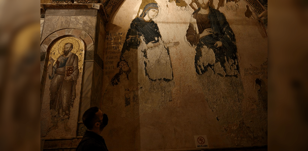 A tourist visits the Chora or Kariye Museum, formally the Church of the Holy Saviour, a medieval Byzantine Greek Orthodox church, decorated with 14th-century frescoes of the Last Judgement, in the Fatih district of Istanbul on August 21, 2020.  Credit: AFP Photo