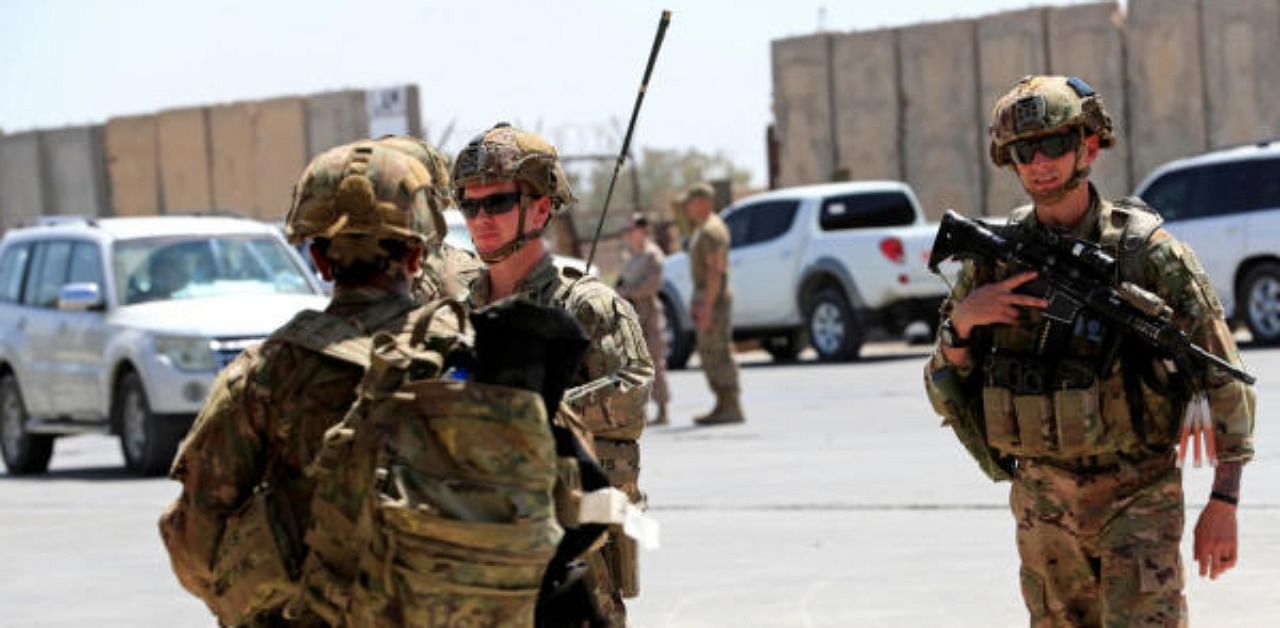 US soldiers are seen during a handover ceremony of Taji military base from US-led coalition troops to Iraqi security forces. Credit: Reuters