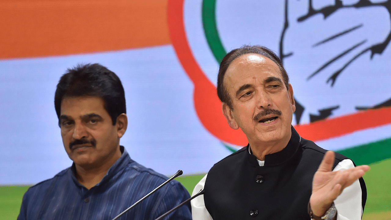 Senior Congress leader Ghulam Nabi Azad with party leader KC Venugopal. Credits: PTI Photo