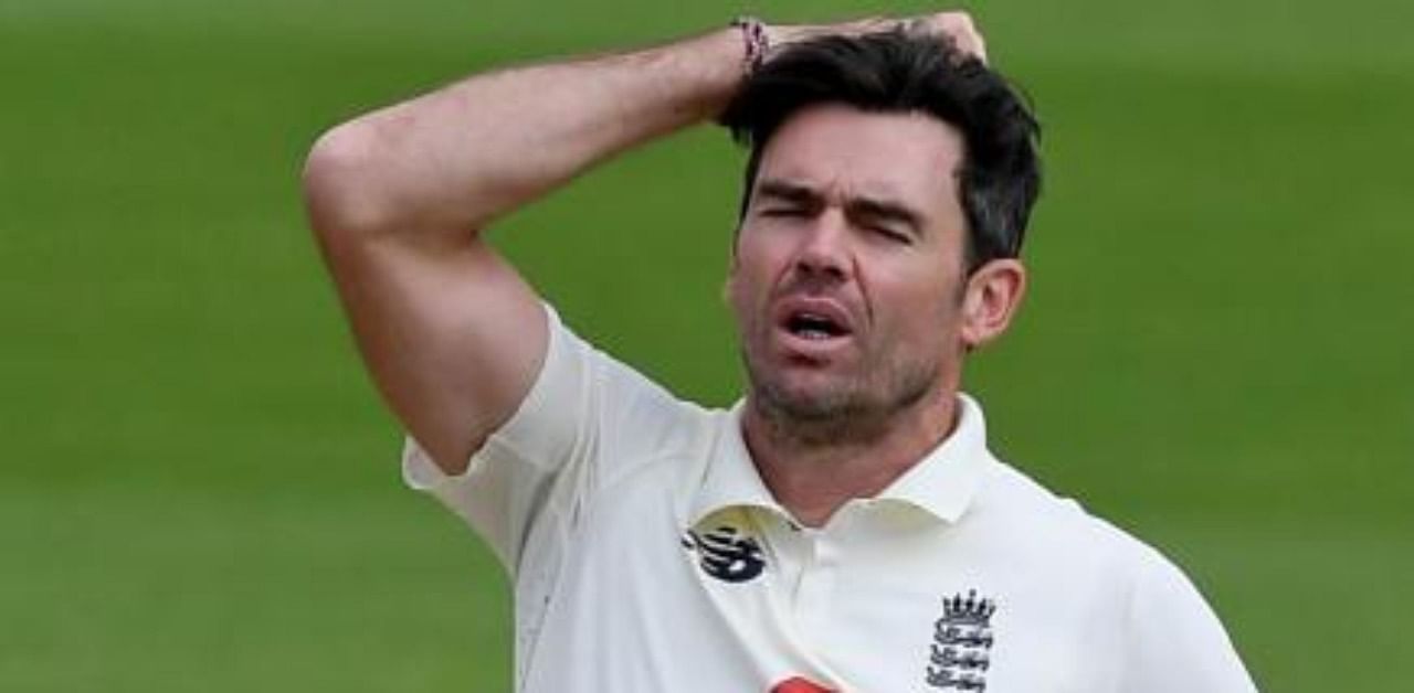 England's James Anderson reacts after England's Jos Buttler (not pictured) fails to take a catch off his bowling on the fourth day of the third Test cricket match between England and Pakistan at the Ageas Bowl in Southampton, southern England. Credit: AFP Photo