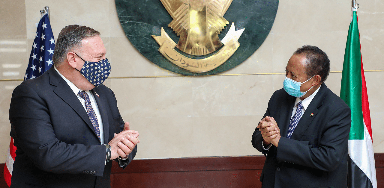 US Secretary of State Mike Pompeo (L) greeting Sudanese Prime Minister Abdalla Hamdok (R) in Khartoum. Credit: AFP Photo