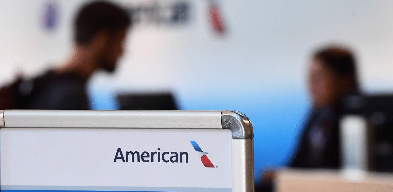 A passenger checks-in at an American Airlines check-in counter. Credit: AFP Photo
