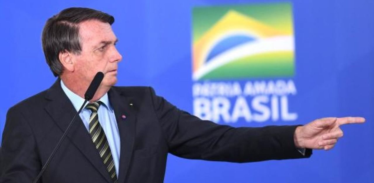 Brazilian President Jair Bolsonaro delivers a speech during the event "Brazil beating Covid-19" at Planalto Palace in Brasilia. Credit: AFP Photo