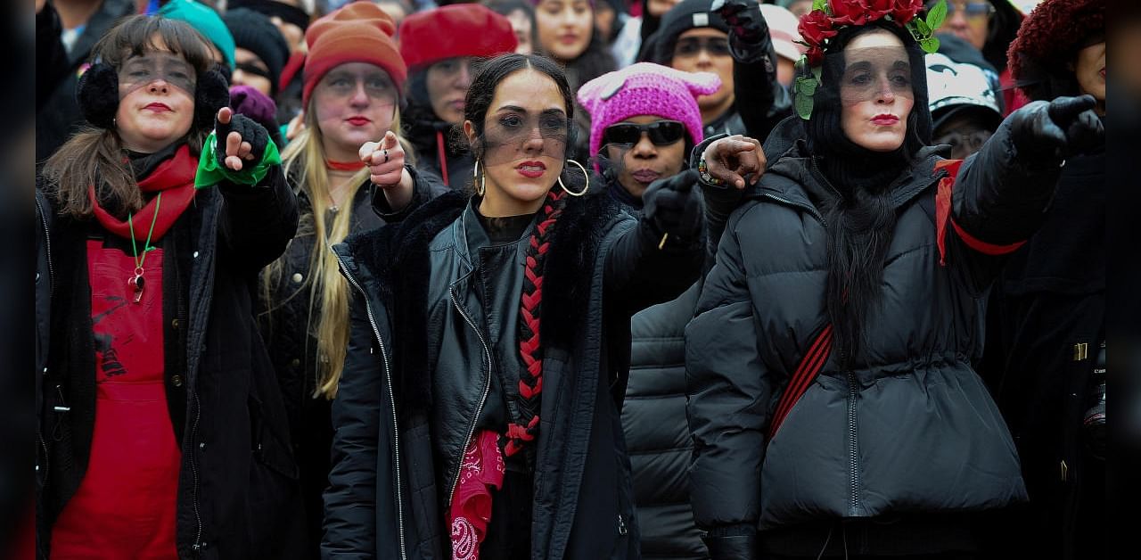 Members of Las Tesis perform the Chilean feminist protest anthem "Un violador en tu camino" (A Rapist in Your Path) during the 2020 Women's March in Washington. Credits: Reuters