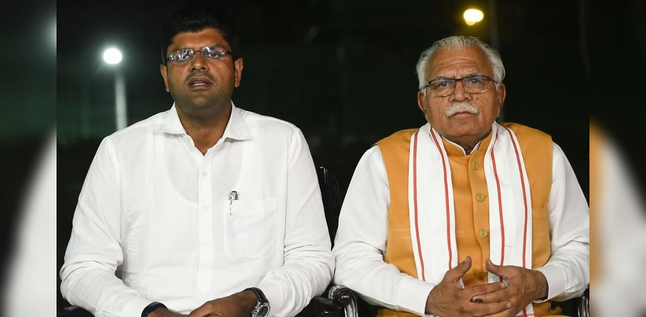 Haryana Chief Minister Manohar Lal Khattar and Deputy Chief Minister Dushyant Chautala. Credit: PTI Photo