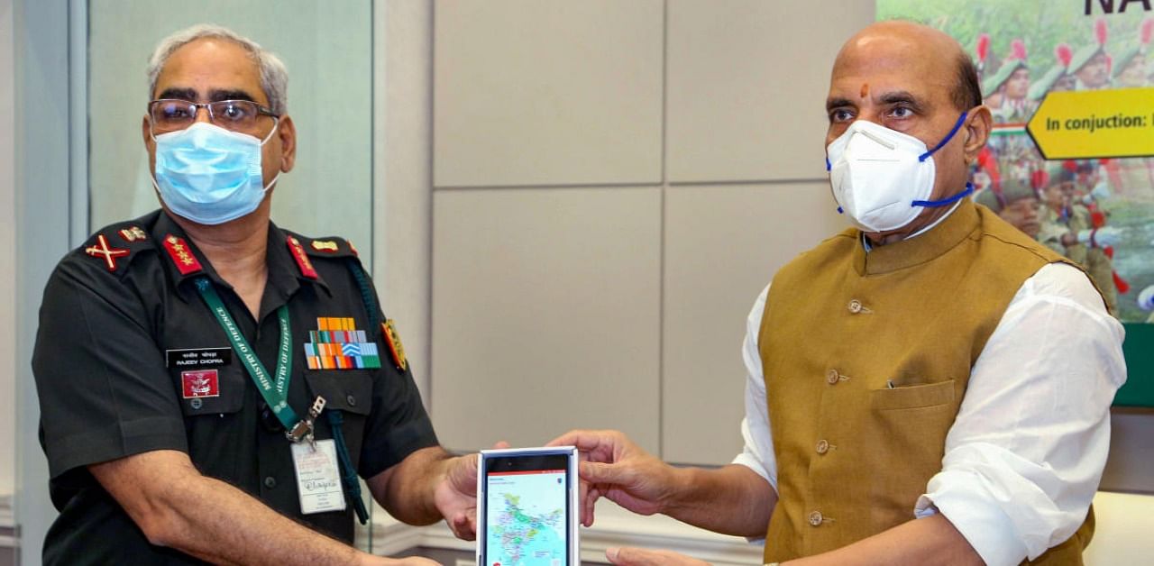Defence Minister Rajnath Singh with DG NCC Lt General Rajeev Chopra during the launch of DGNCC Mobile Training App for the benefit of National Cadet Corps cadets to help train themselves. Credits: PTI
