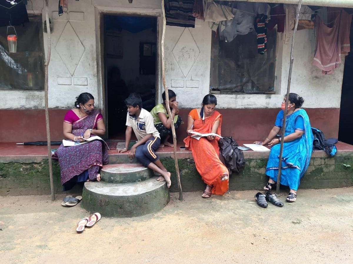 Teachers conduct lessons at a house at Ontedakaje in Panapila in Moodbidri taluk.