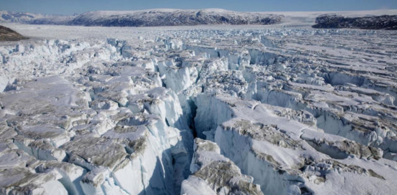 Crevasses form on top of the Helheim glacier near Tasiilaq, Greenland. Credit: Reuters