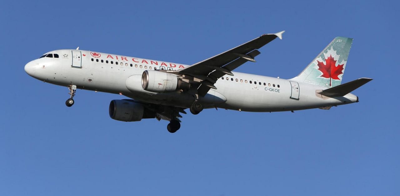 Air Canada is planning a voluntary Covid-19 test trial for passengers arriving at the country's largest airport to help persuade the federal government to end stringent quarantine rules . Credits: Reuters