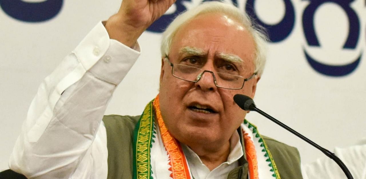 Sibal reiterated that his loyalties lie with the INC and that him and the BJP "are North Pole and South Pole." Credits: DH Photo