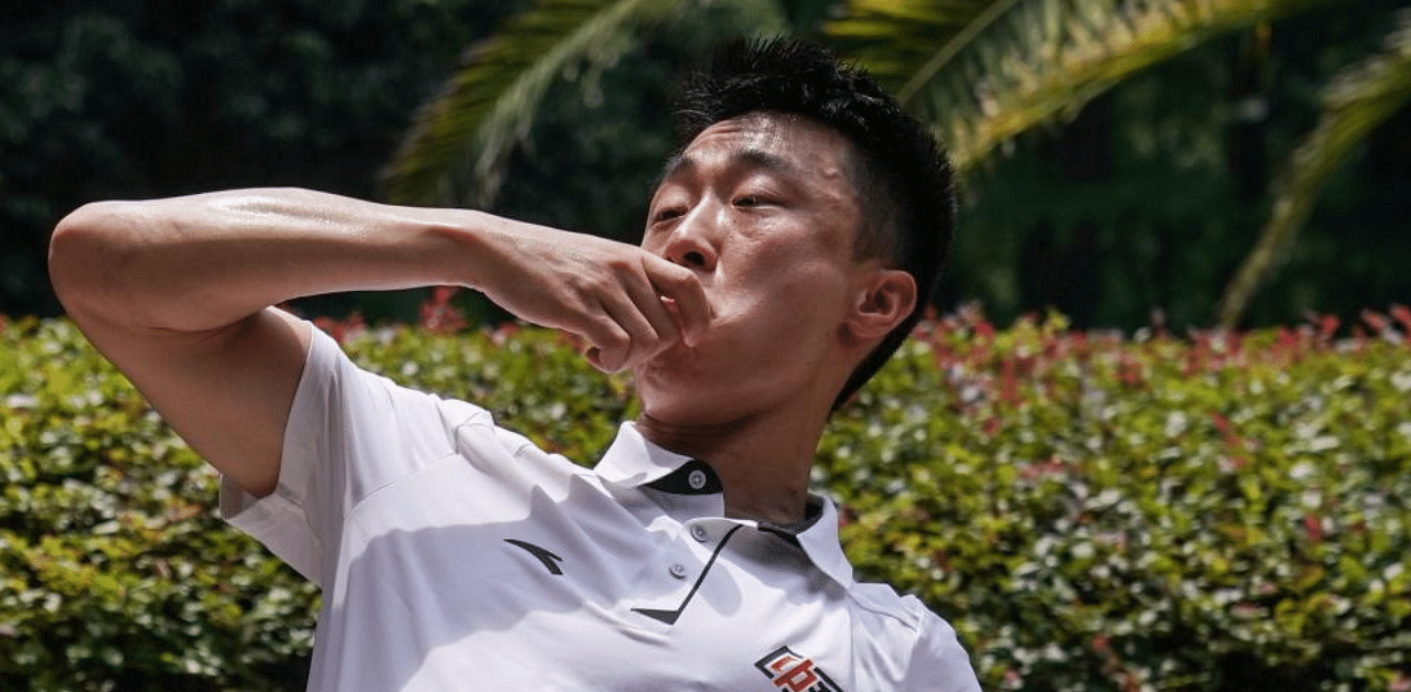 Liu Xuliang, a martial art master, playing a martial art which known as drunk boxing in Shanghai. Credit: AFP