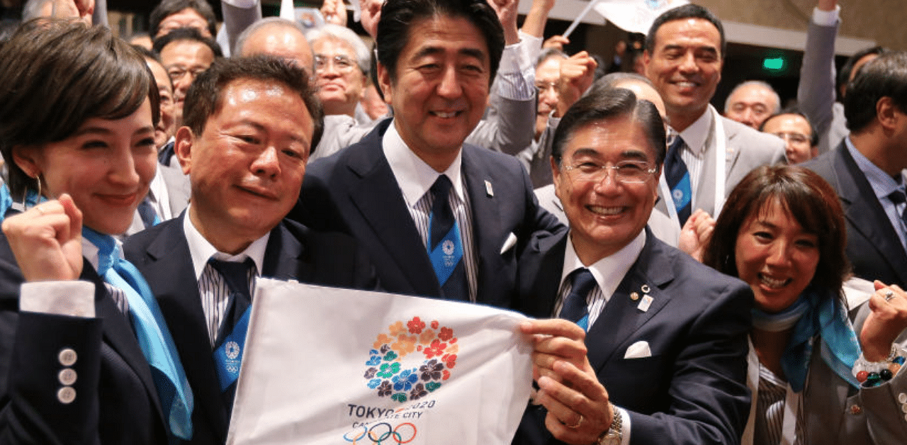 Tokyo 2020 CEO Masato Mizuno, Prime Minister of Japan Shinzo Abe, Governor of Tokyo, Naoki Inose and 'Cool Tokyo' Ambassador Christel Takigawa celebrate as Tokyo is awarded the 2020 Summer Olympic Gamesduring the 125th IOC Session - 2020 Olympics Host City Announcement at Hilton Hotel on September 7, 2013 in Buenos Aires, Argentina. Credit: Getty Images