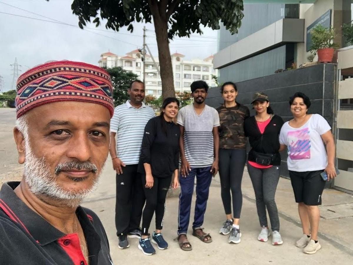 Founder trustee of Tiger Adventure Foundation Deepak Solanki with his partners in walking, including assistant professor Devanuru Goutham in Mysuru, recently.