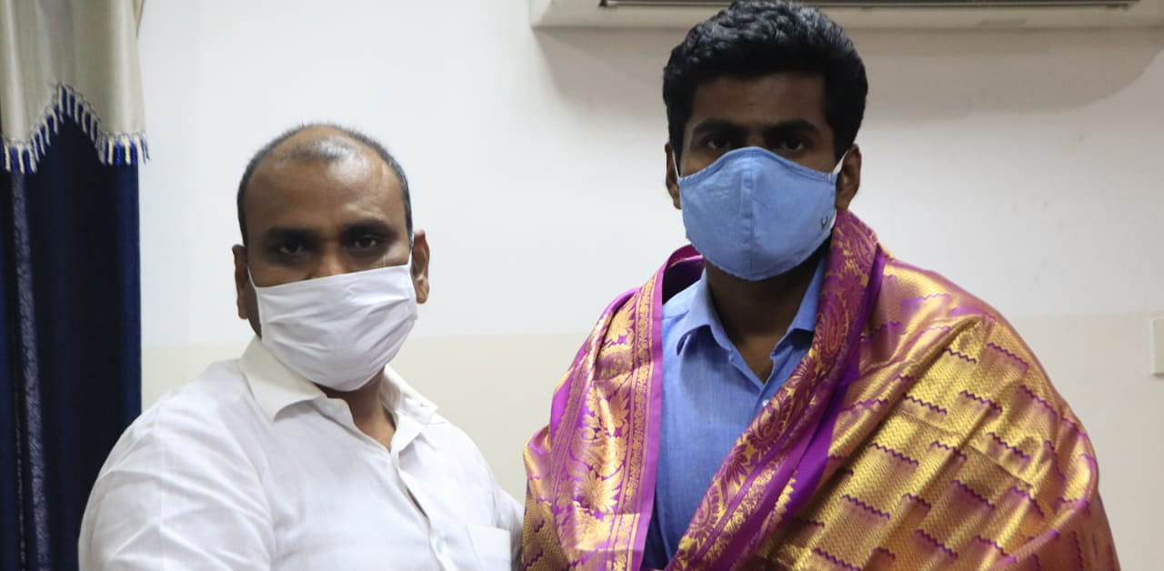 Former IPS officer K Annamalai with Tamil Nadu BJP President L Murugan on Saturday. Credit: DH Photo