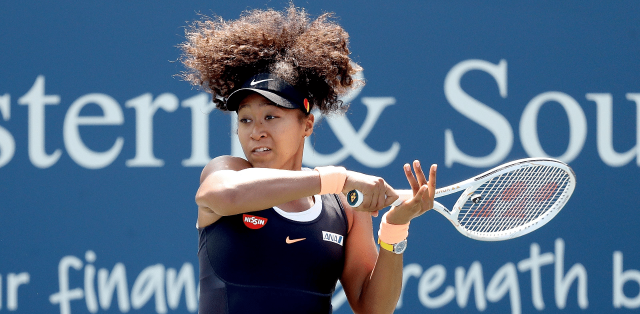 Naomi Osaka of Japan returns a shot to Elise Mertens of Belgium during the Western & Southern Open at the USTA Billie Jean King National Tennis Center. Credit: AFP Photo