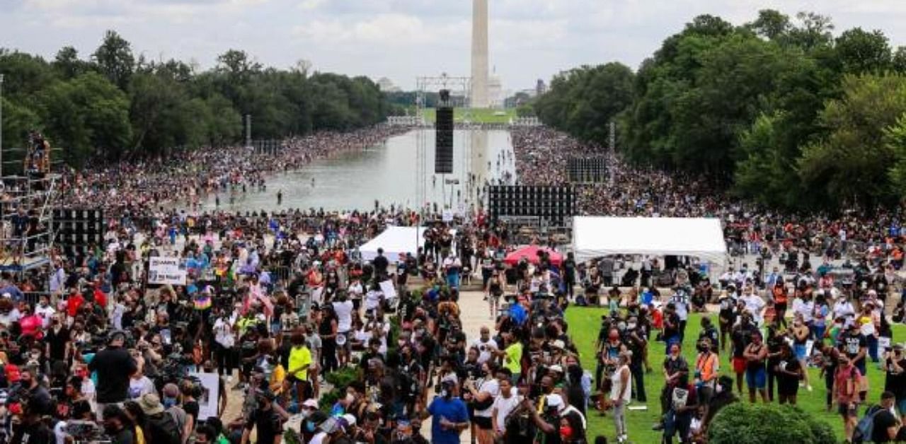 Crowds fill the National Mall during the Commitment March. Credit: AFP Photo