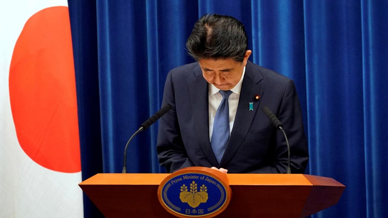 Japanese Prime Minister Shinzo Abe bows during a news conference at the Prime Minister's official residence in Tokyo. Credit: Reuters