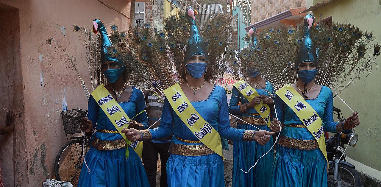 Members of the transgender community perform a peacock dance during an awareness raising campaign against the spread of the Covid-19 coronavirus, at a residential area in Chennai. Credit: AFP