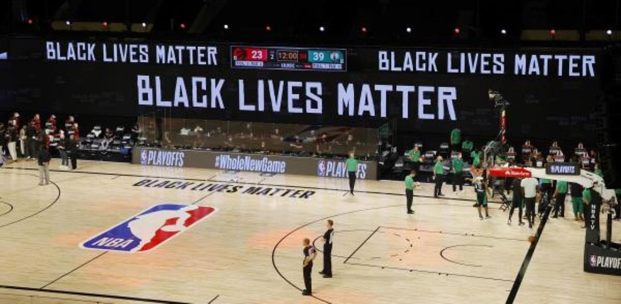 Black Lives Matter is displayed on the boards during the first quarter in Game One of the Eastern Conference Second Round between the Toronto Raptors and the Boston Celtics during the 2020 NBA Playoffs. Credit: AFP