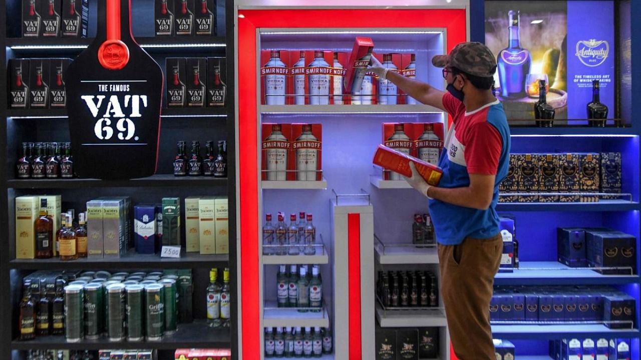After a complete shutdown of liquor sales in March following the first Covid-19 lockdown, the state government had allowed sale of liquor in May through MRP outlets. Representative image. Credit: AFP