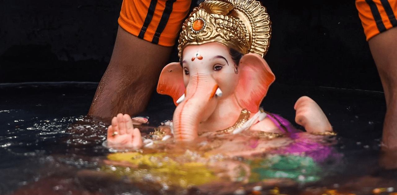 Till Tuesday noon, a total of 492 Ganesh idols, including 16 from public pandals and 476 installed by residents at home, were immersed at various visarjan points here. Credit: PTI Photo
