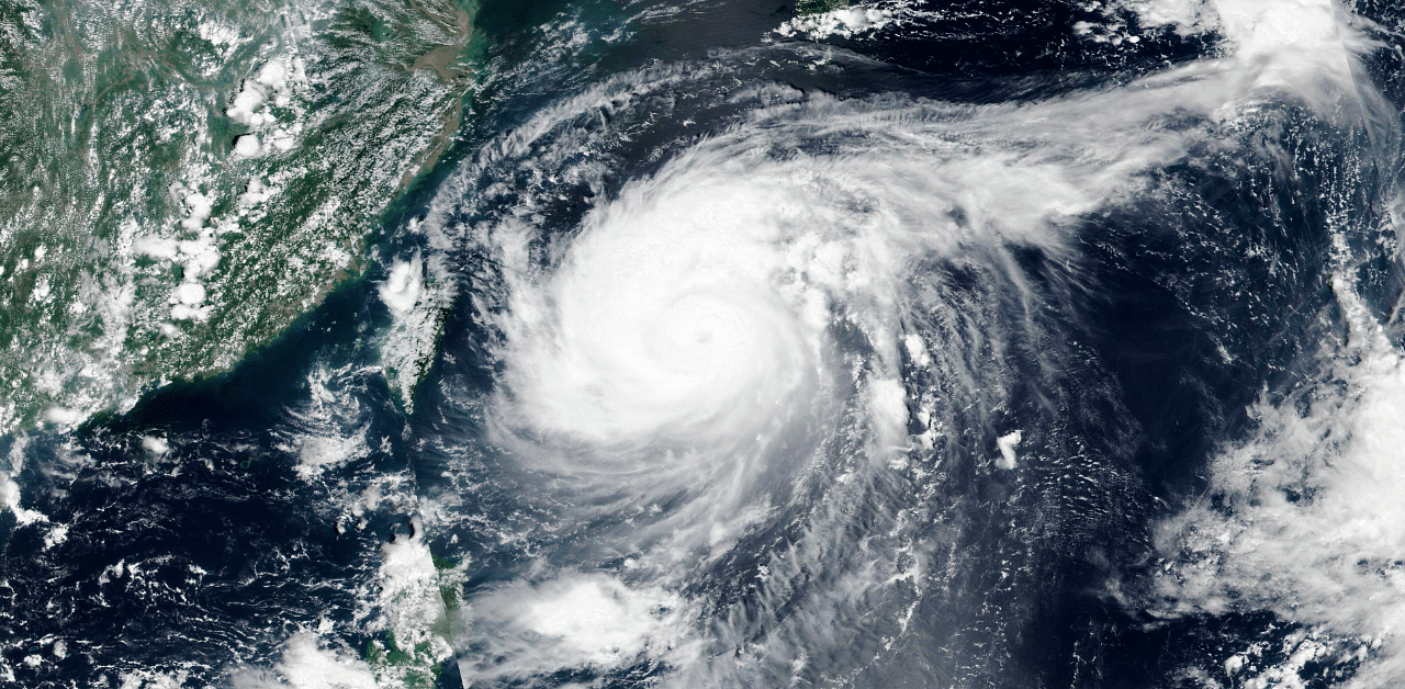Satellite image released by NASA shows Typhoon Maysak over Japan's southernmost islands, including Okinawa, center. Credit: AP Photo