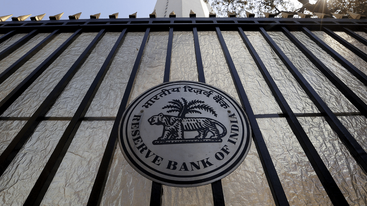 The Reserve Bank of India (RBI) seal is pictured on a gate outside the RBI headquarters. Credits: Reuters Photo
