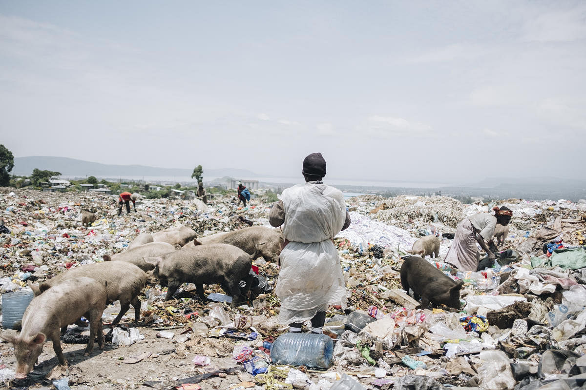 A dump in Nakuru, Kenya. Faced with plunging profits and a climate crisis that threatens fossil fuels, the fossil fuel industry is demanding a trade deal that weakens Kenya's rules on plastics and on imports of American trash. The New York Times