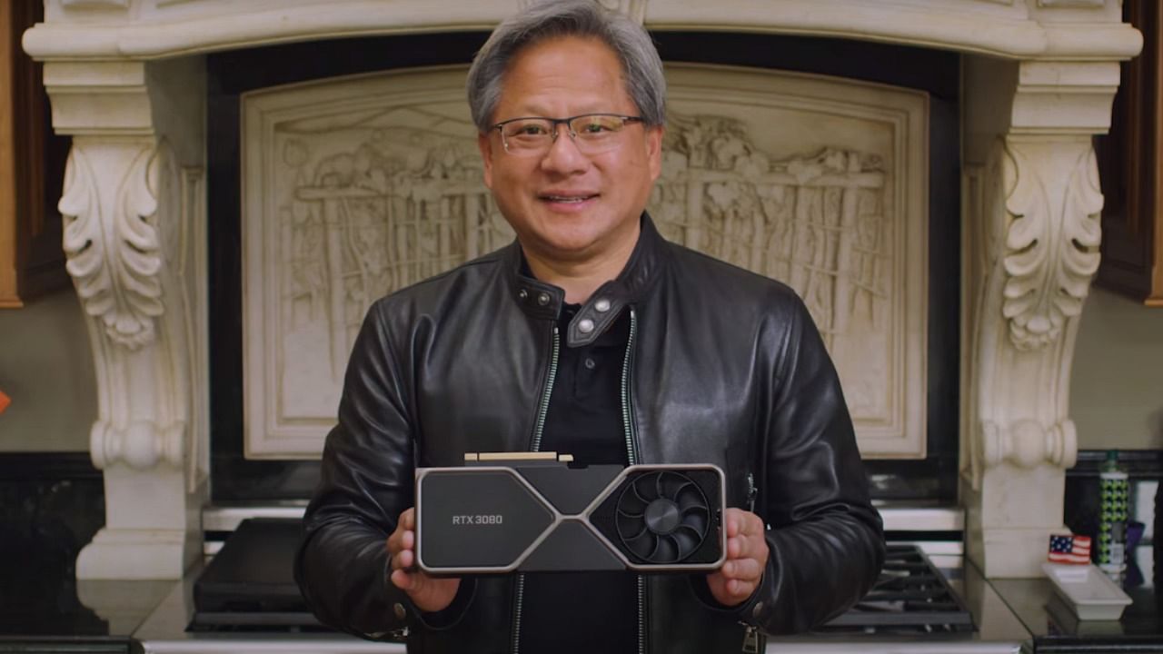 Nvidia CEO Jensen Huang holding the new GeForce RTX 3080.